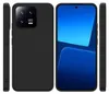 A black silicone phone case for a Xiaomi 13 Pro is shown from multiple angles, including the back with the camera module and the front displaying a blue screen. Produktbild-Vorschau