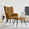 A brown velvet armchair and ottoman are shown in a living room setting. Voir les images du produit