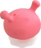 A pink mushroom-shaped teething toy on a white base. Produktbild-Vorschau