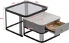 A set of two nesting coffee tables with a glass top on the larger table and a marble-look top on the smaller table, which has a drawer. Voir les images du produit