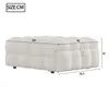 A product shot of a beige upholstered ottoman with dimensions indicated. Produktbild-Vorschau