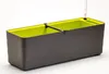 A self-watering planter box with a green interior and gray exterior, shown against a white background. Náhled obrázku produktu