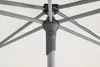 A close-up view of the internal mechanism of an umbrella, showing the central pole, spokes, and fabric. Produktbild-Vorschau