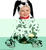 A baby wearing a Dalmatian dog costume. Produktbild-Vorschau