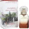 A box and bottle of Hermes Un Jardin Sur La Lagune Eau de Toilette. Voir les images du produit