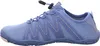 A side view of a blue women's athletic shoe. Podgląd zdjęcia produktu