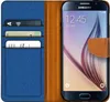 A Samsung Galaxy S6 phone in a blue and brown flip case with card slots. Produktbild-Vorschau
