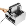 A hand is holding wooden handles of a waffle maker. Podgląd zdjęcia produktu