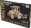 The image shows the packaging of a wooden 3D mechanical model construction kit of a tractor. Náhľad obrázku produktu