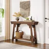 A wooden console table with decorative items in a hallway. Podgląd zdjęcia produktu