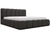 A dark gray upholstered bed with a white mattress against a white background. Produktbild-Vorschau
