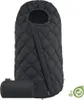 A black quilted stroller footmuff is shown laid out flat, with a smaller rolled-up version of the footmuff in the bottom left corner. A green leaf logo is in the bottom right corner. Produktbild-Vorschau