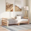 A bedroom scene with a wooden daybed, pillows, and a blanket. Náhľad obrázku produktu