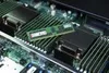 A close-up view of computer RAM modules installed on a motherboard. Náhľad obrázku produktu