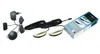 A product shot of an electronic foot massager kit with its accessories and packaging, laid out on a white background. Produktbild-Vorschau