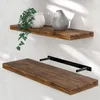 Two wooden shelves mounted on a white wall, with decorative items on the top shelf. Produktbild-Vorschau