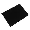 A black silicone mat for an induction hob, shown from a slightly elevated angle on a white background. Náhľad obrázku produktu