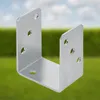 A metal U-shaped bracket is shown against a blurred background of green grass and blue sky. Produktbild-Vorschau