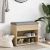 A shoe bench with storage and a cushioned top, placed in a hallway or entryway. Produktbild-Vorschau