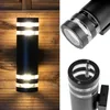 A collage of images showing an outdoor wall light fixture mounted on a wooden wall and close-up views of the fixture. Anteprima dell’immagine prodotto