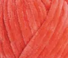 A close-up view of orange yarn. Produktbild-Vorschau