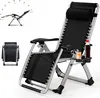 A black foldable zero gravity chair with a silver frame, shown in a reclined position with a drink and a small item on a side tray. There are inset images showing the chair folded and its reclining angles. Náhled obrázku produktu