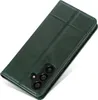 A green leather phone case with a flip cover is shown from a diagonal angle. Produktbild-Vorschau