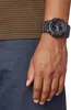 A close-up shot of a person's wrist wearing a black Casio G-Shock watch. Produktbild-Vorschau
