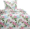 A close-up view of a floral patterned duvet cover and pillowcase set. Produktbild-Vorschau
