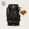 A black child car seat with pink trim is shown against a light beige background. Icons and a close-up diagram highlight features. Produktbild-Vorschau