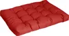 A red tufted cushion on a white background. Produktbild-Vorschau