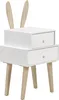 A white bedside table with two drawers and wooden legs, featuring decorative wooden bunny ears on top. Náhľad obrázku produktu