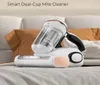 A mite cleaner is placed on a bed with pillows in the background. Anteprima dell’immagine prodotto