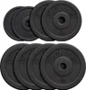 A set of black weight plates stacked in two rows against a white background. Náhled obrázku produktu
