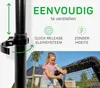 A girl is using a rebounder in a backyard setting, with text overlays highlighting features. Produktbild-Vorschau