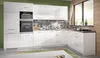 A modern, high-gloss white L-shaped kitchen unit with integrated appliances and a decorative backsplash. Produktbild-Vorschau