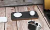 A wireless charging pad with an Apple Watch and AirPods case on a wooden surface, with a laptop in the background. Anteprima dell’immagine prodotto
