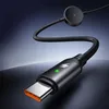 A close-up, studio shot of a black USB-C charging cable with a lightning bolt symbol and a green indicator light. Podgląd zdjęcia produktu