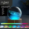 A crystal ball with a solar system engraving, illuminated by colorful LEDs, resting on a wooden base. A color spectrum is shown below, with small swatches of different colors. Voir les images du produit