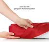 Hands are shown tucking a red sheet over a mattress. Produktbild-Vorschau