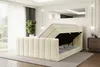 A bedroom scene featuring a beige velvet boxspring bed with its storage compartment open. Produktbild-Vorschau