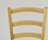 Close-up of the back of a wooden chair with three horizontal slats. Produktbild-Vorschau