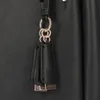 Schwarze Damen-Tasche mit Henkel & Reißverschlusstaschen – Produktbild-Vorschau 8