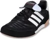 A black Adidas Mundial Goal soccer shoe with white stripes and a tan sole. Náhled obrázku produktu