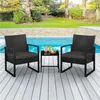 A three-piece outdoor furniture set with two chairs and a table is placed on a wooden deck next to a swimming pool. Podgląd zdjęcia produktu