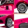A collage of four close-up images of a pink toy electric car. Produktbild-Vorschau