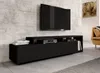 A modern living room with a black TV stand and a large flat-screen TV mounted on a concrete wall. Náhled obrázku produktu