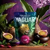 A still life arrangement featuring a bag of Yaguar Yerba Mate Tea with passion fruit and dried tea leaves. Produktbild-Vorschau