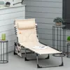 An outdoor patio scene with a lounge chair, side tables, and plants. Produktbild-Vorschau