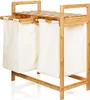 A product shot of a bamboo laundry basket with two white fabric bags. Anteprima dell’immagine prodotto